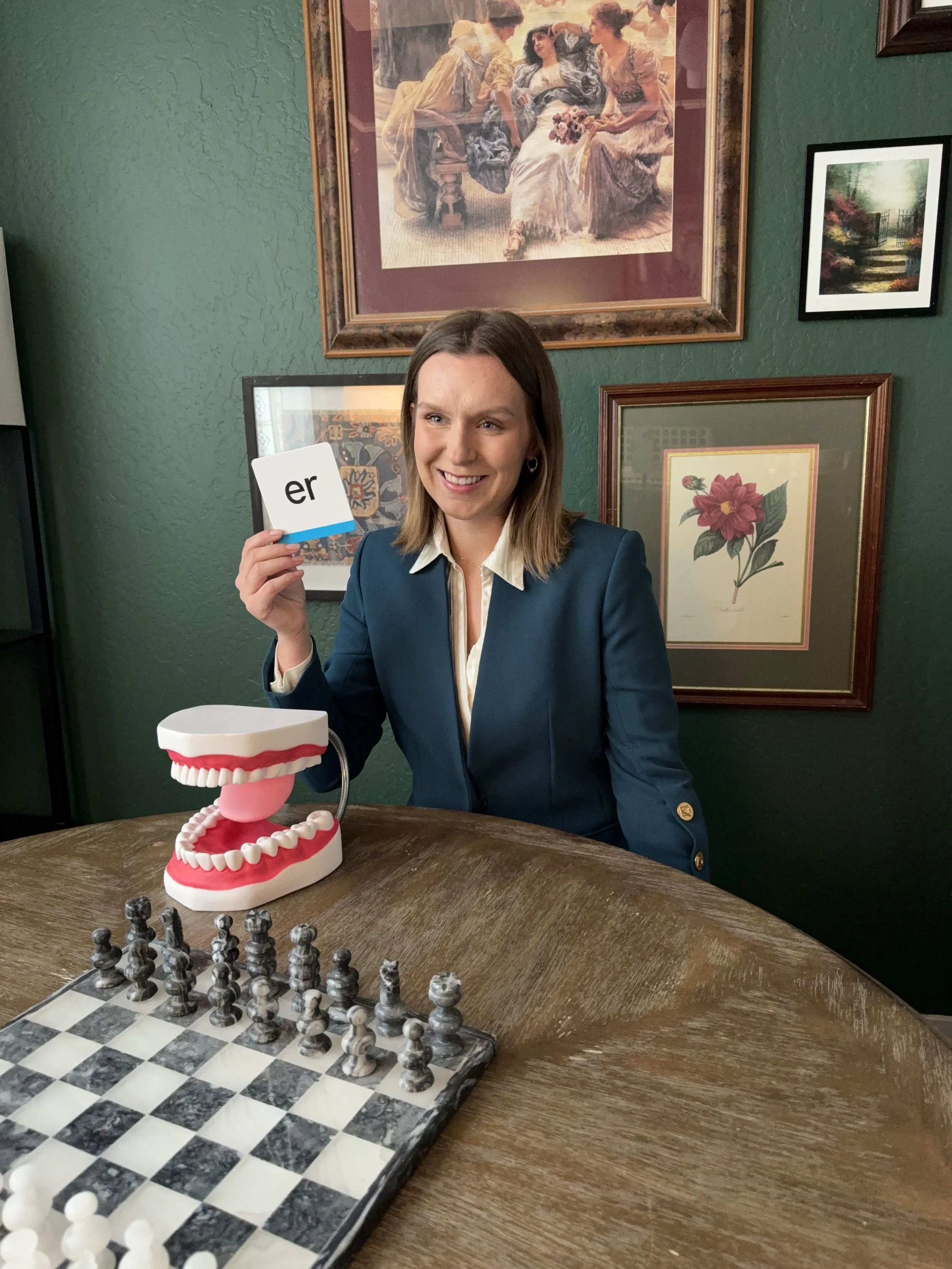 Speech-language pathologist using visual supports during a therapy session