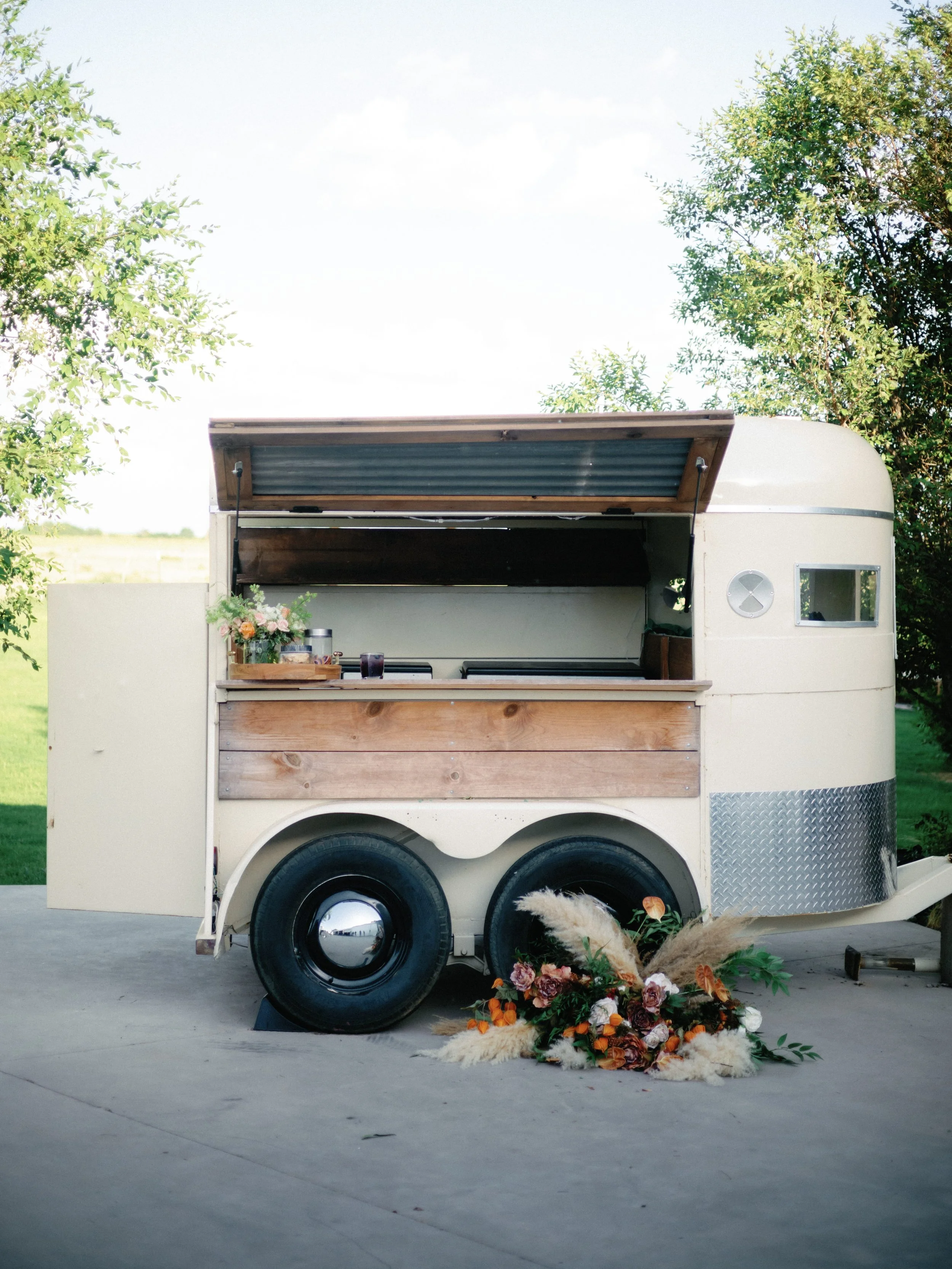 Custom mobile bar trailer for weddings, corporate events, and private parties in West Texas, offering professional bartending services, signature drink menus, and a stylish, fully equipped bar experience.