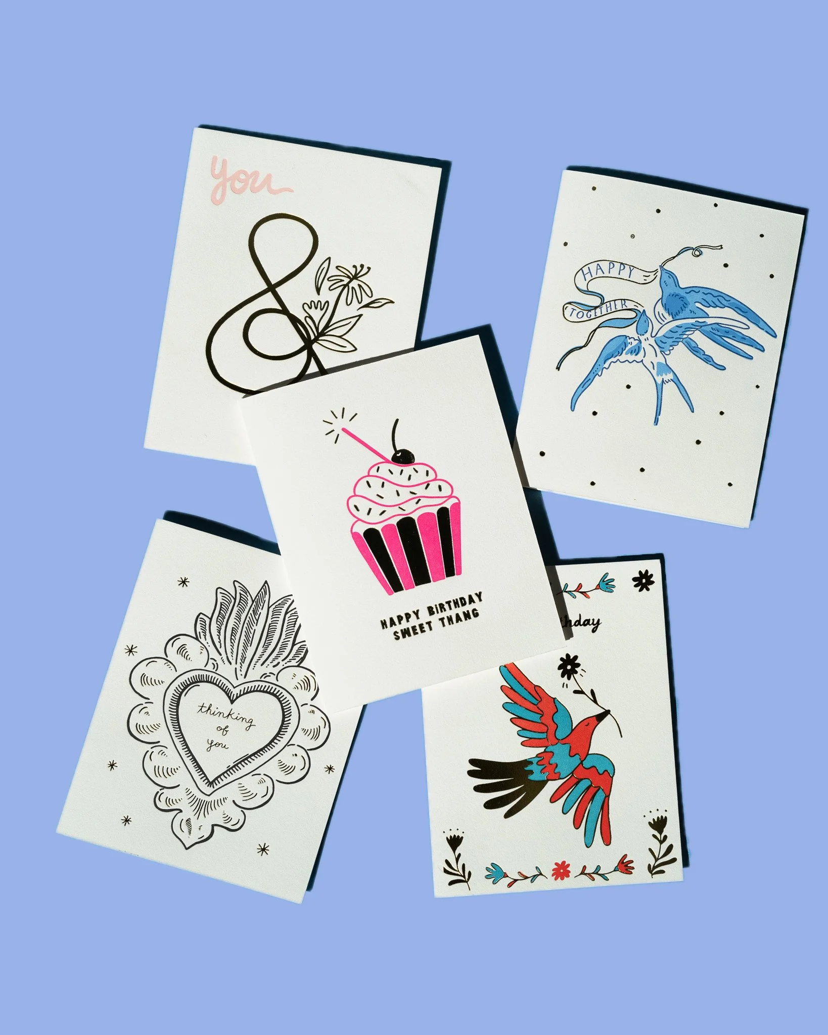 card pile blue flatlay.jpg