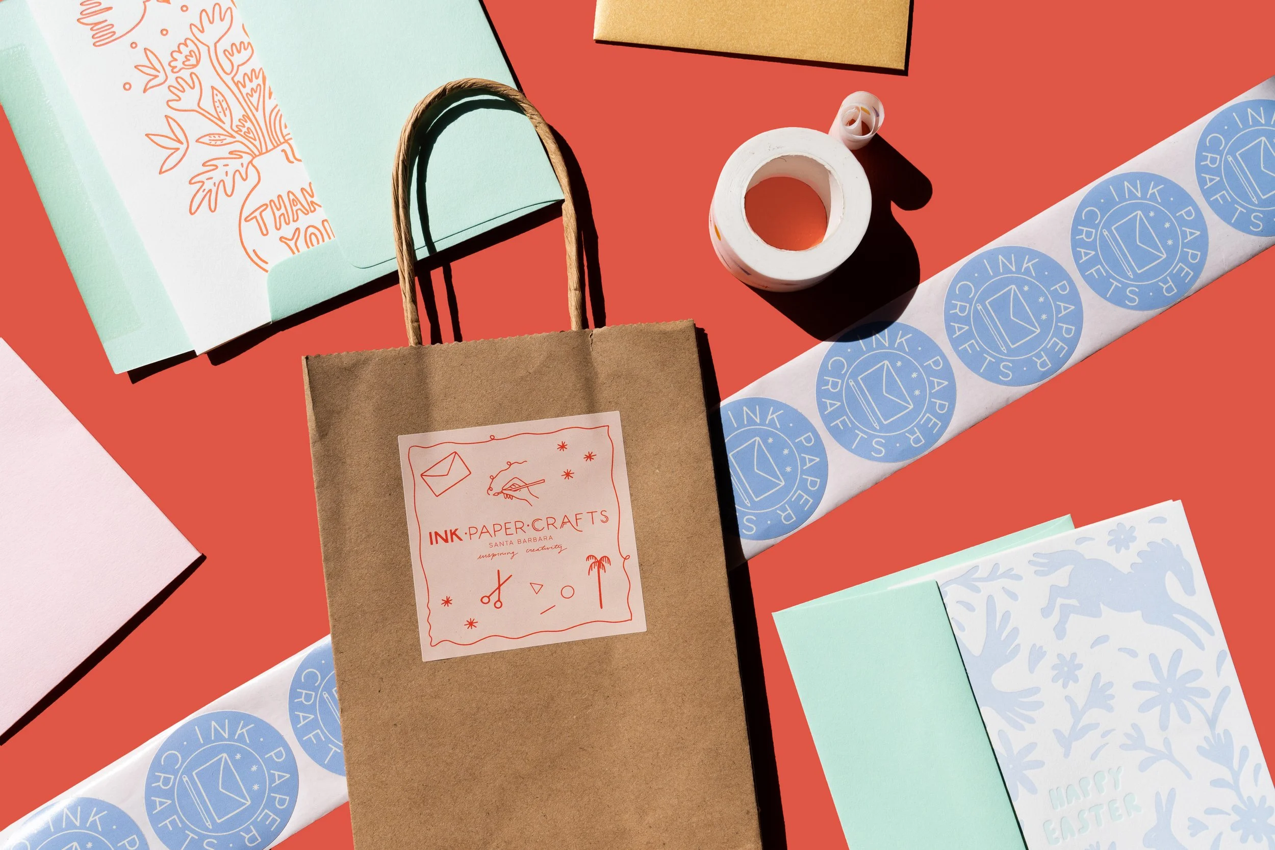 Colorful packaging and collateral design for stationery store Ink.Paper.Crafts