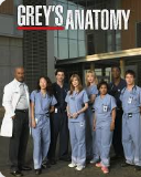 Group of medical professionals standing outside Grey's Anatomy building