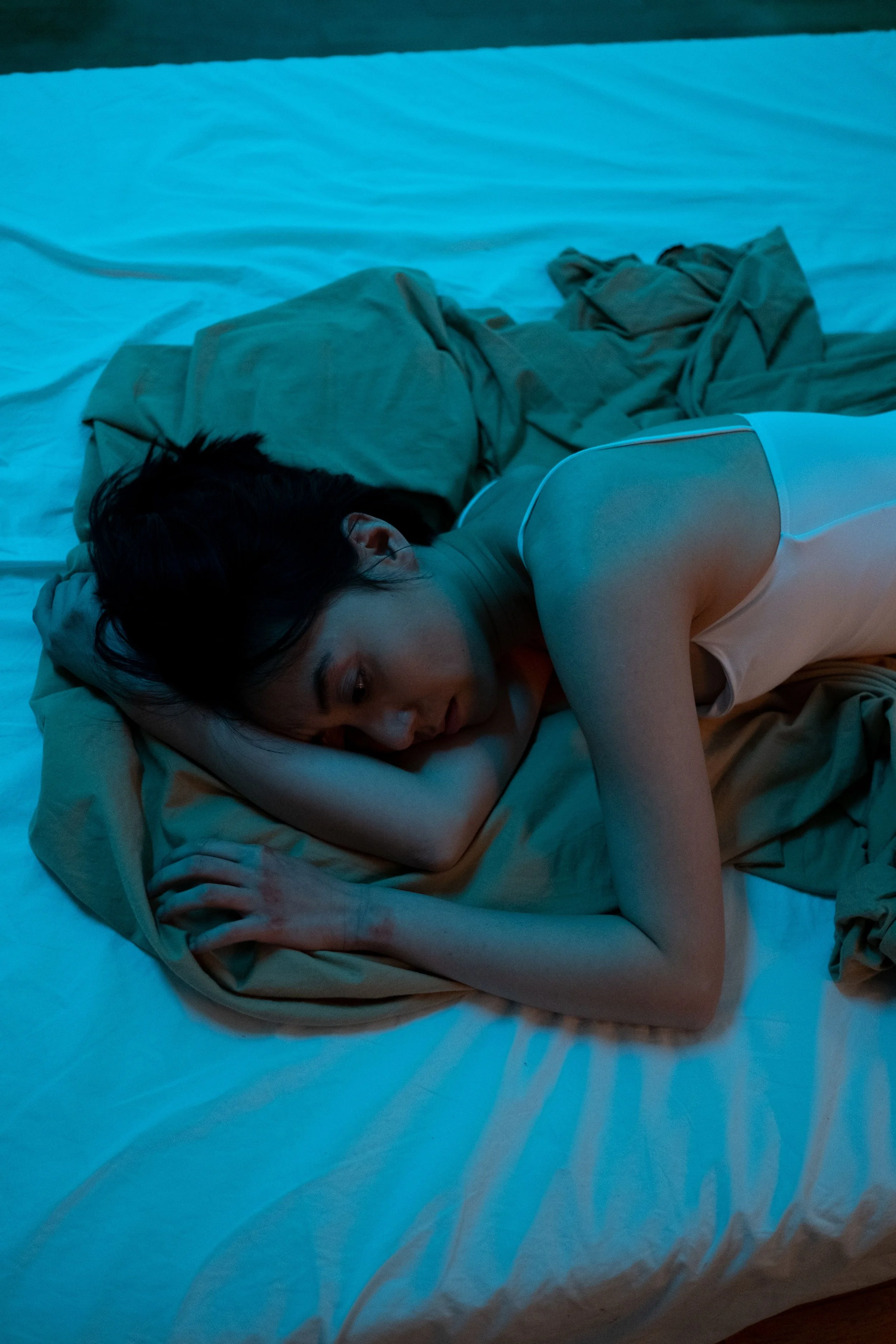 Woman awake at night with anxiety and insomnia