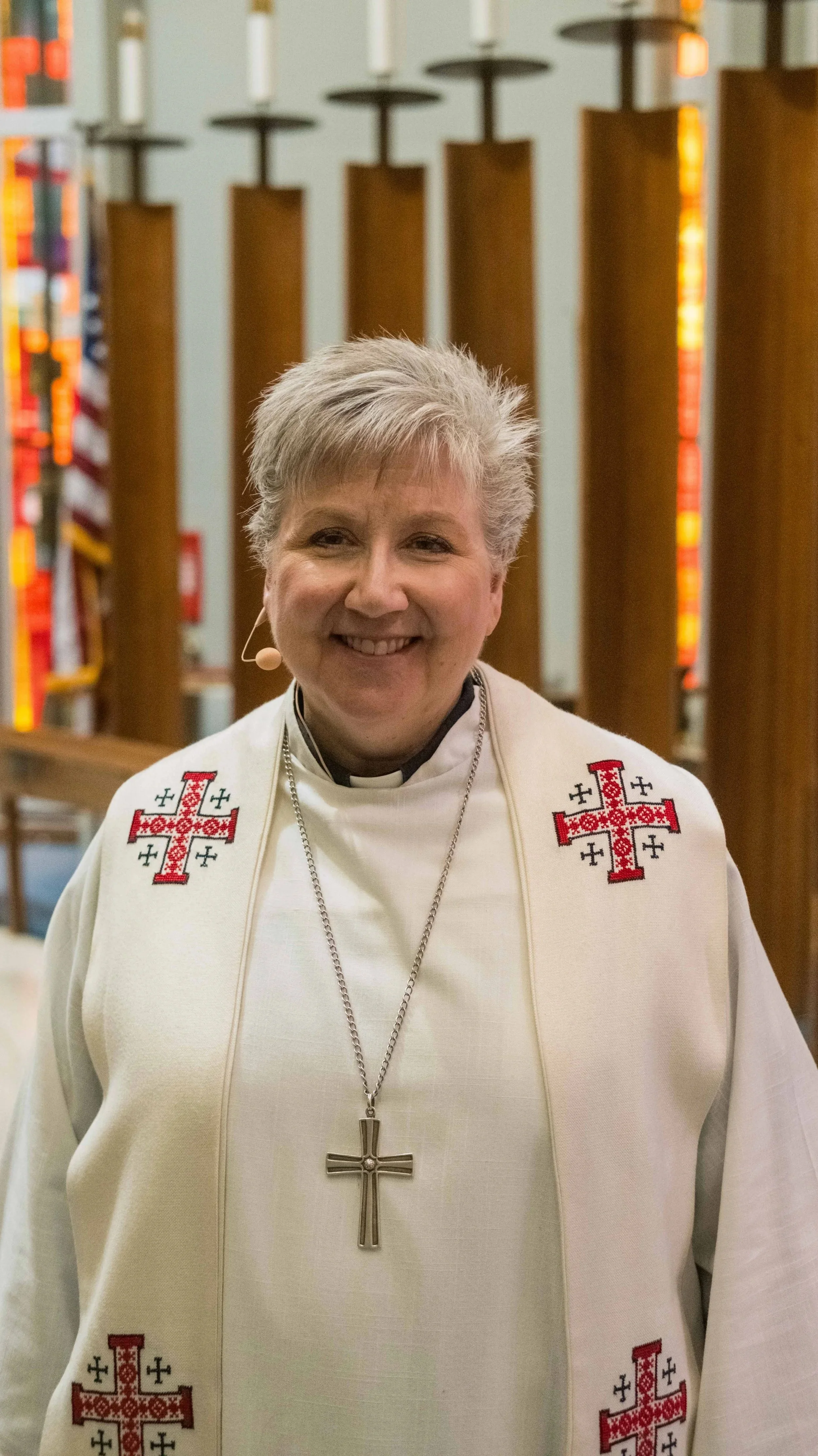 Pastor Sherri at the ALC in Oslo standing in the sanctuary.