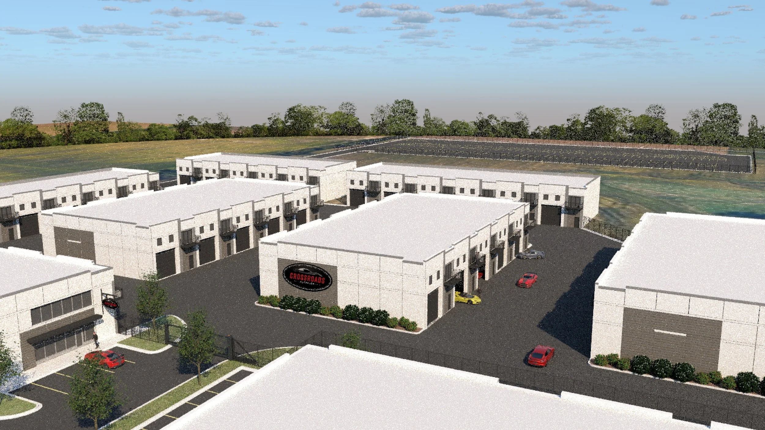 Aerial rendering of The Crossroads Autoplex showing multiple garage condo buildings and drive lanes.