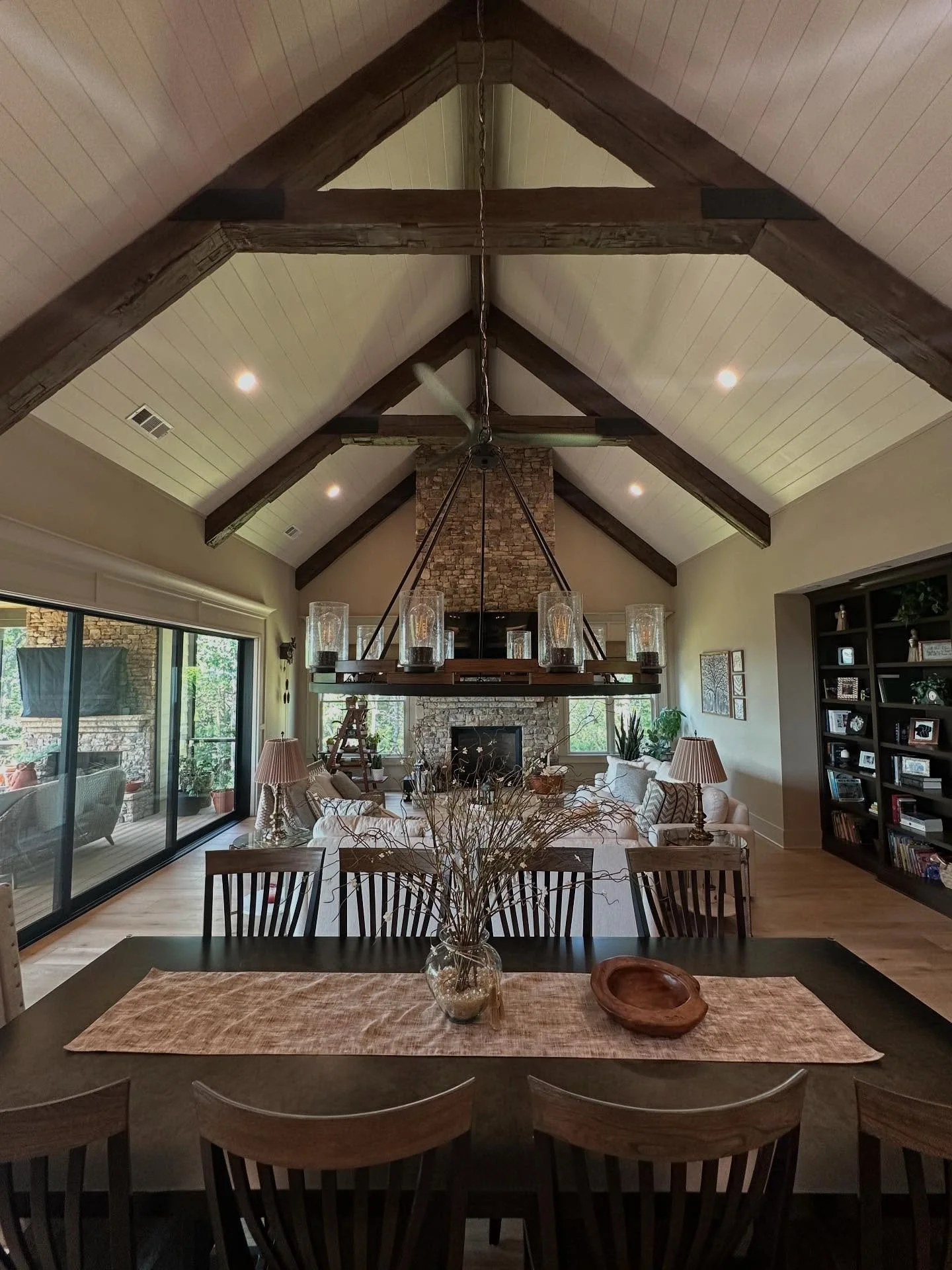 Loving these reclaimed wood beams in this living room!