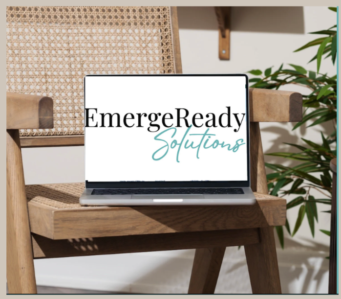 Laptop with EmergeReady logo - Laptop displaying the EmergeReady Solutions logo in a professional workspace.