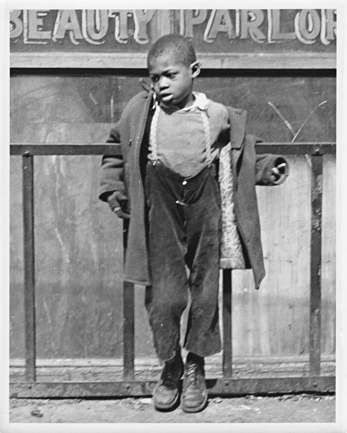 Boy with Arms around Gate-Bedford Stuyvesant-Brooklyn-1949.jpg