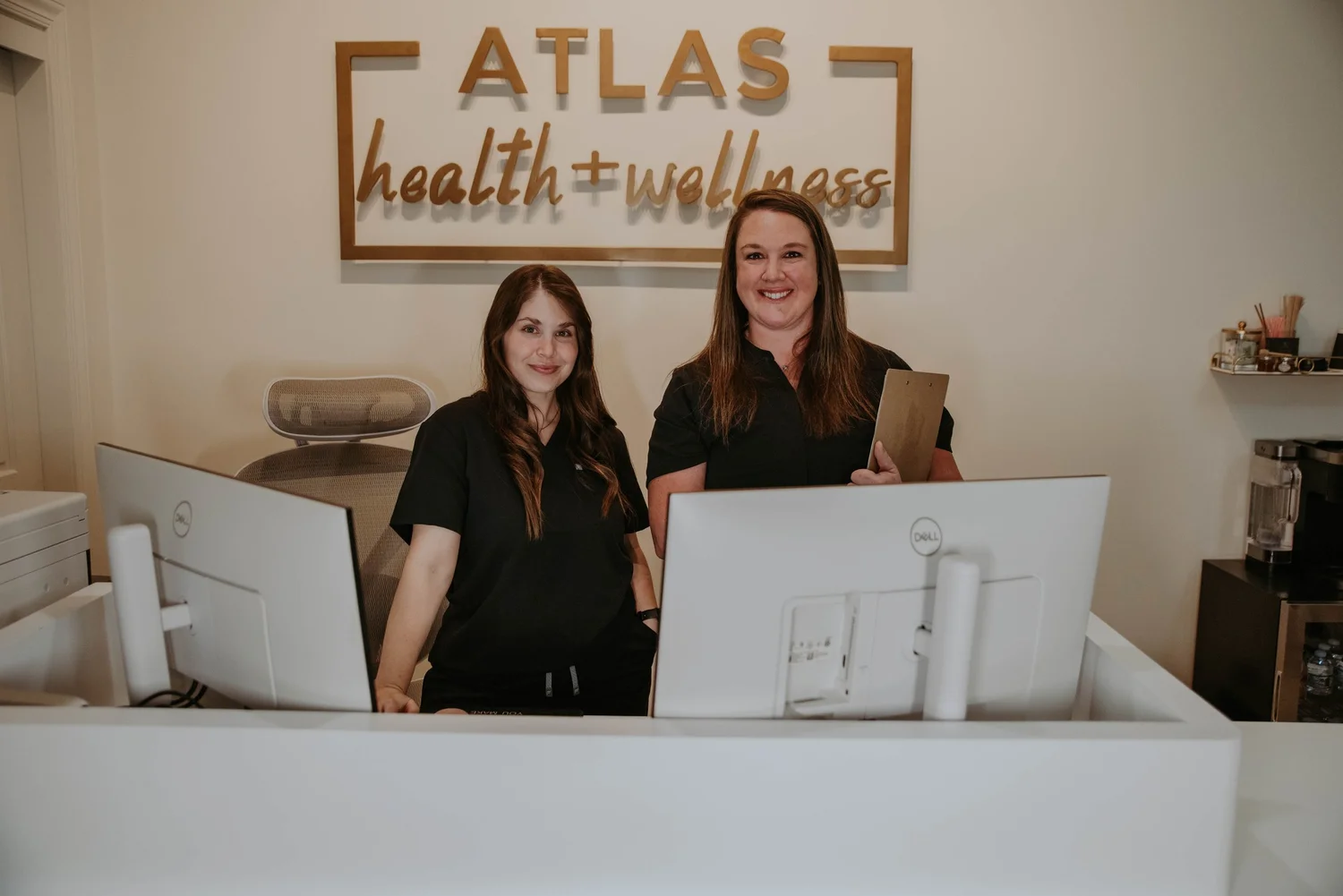 Front desk team at Atlas Health and Wellness in Mount Vernon, Ohio
