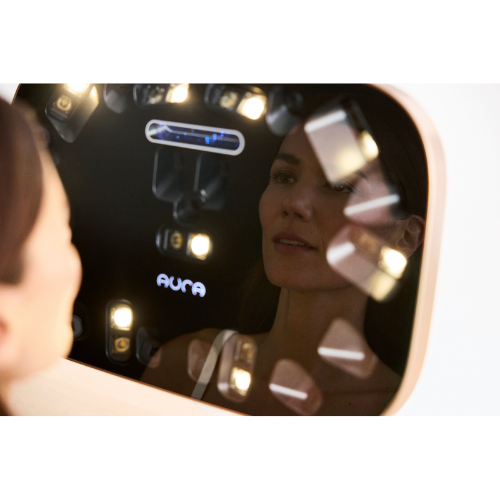 Patient receiving complimentary Aura skin analysis at Atlas Health and Wellness Mount Vernon Ohio