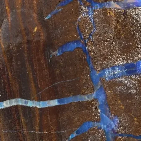 Close-up of blue opal vein in rock. Centred Wellness psychotherapy