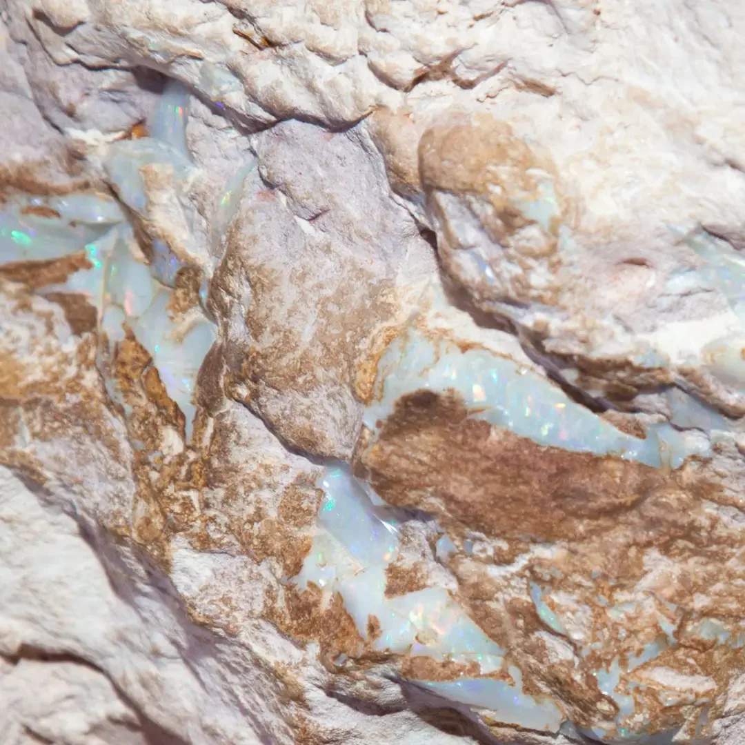 Close-up of iridescent opal veins. Centred Wellness therapy