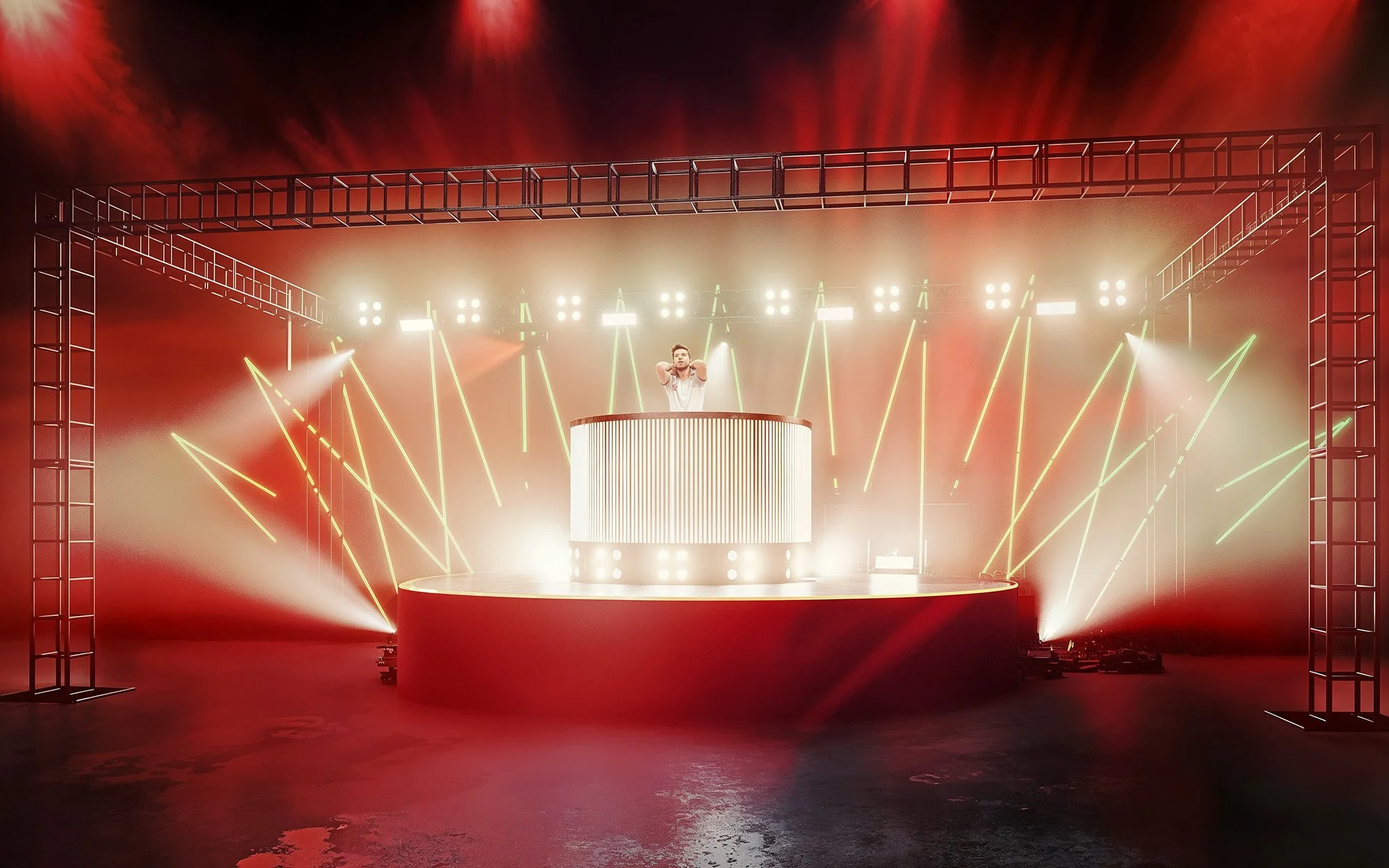 A DJ performs on a stage with colorful lights and fog, framed by a metal structure.