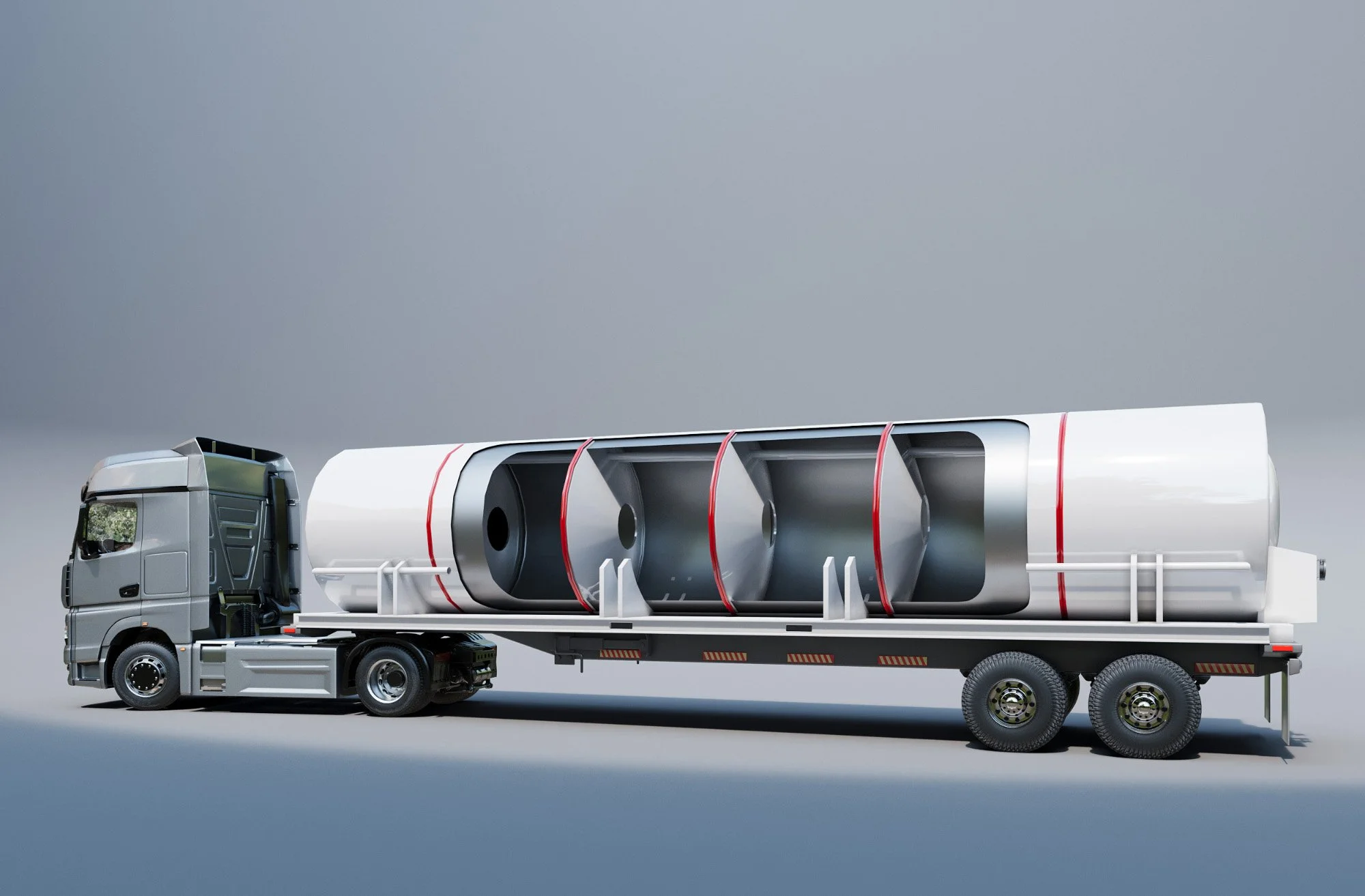 A semi-truck with a large wind turbine blade on its flatbed trailer.