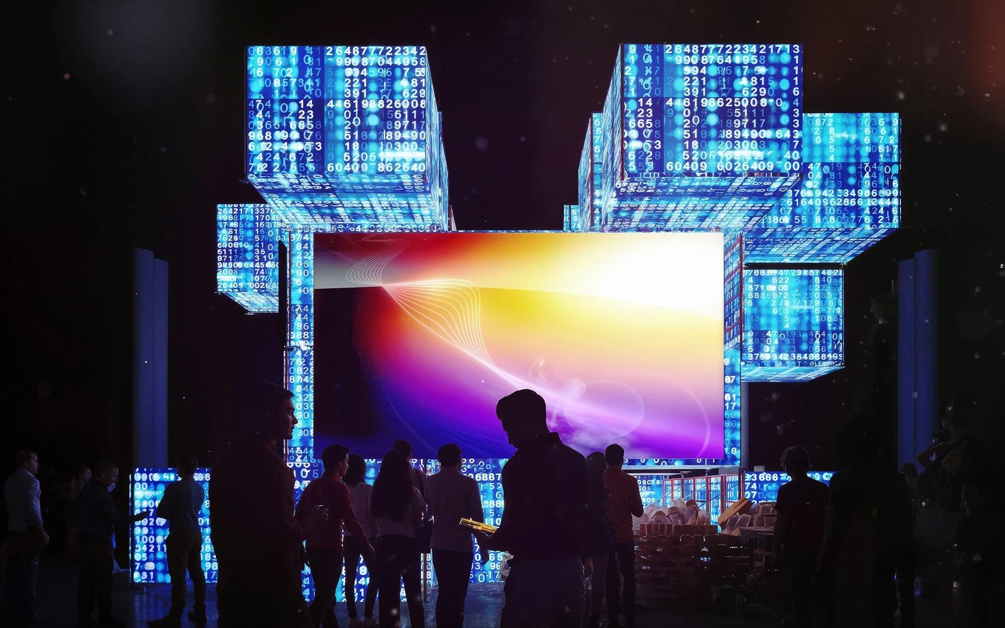 People standing in front of a large digital display with floating blue cubes made of binary code and a colorful abstract background.