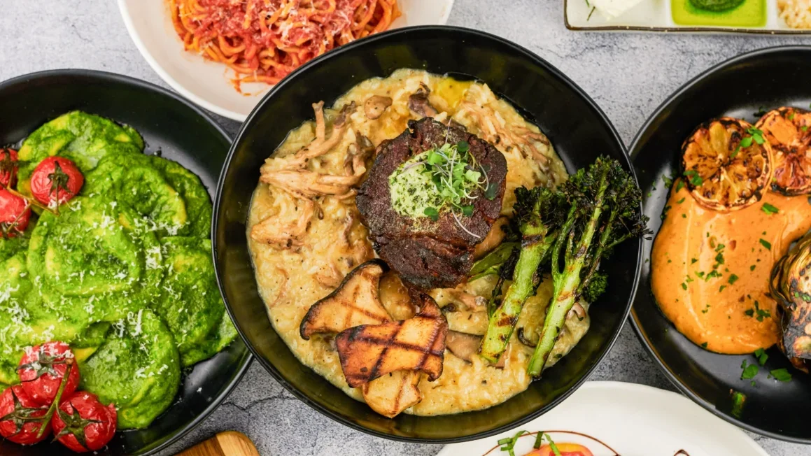 Gourmet dishes in black bowls from Sette Pasta House