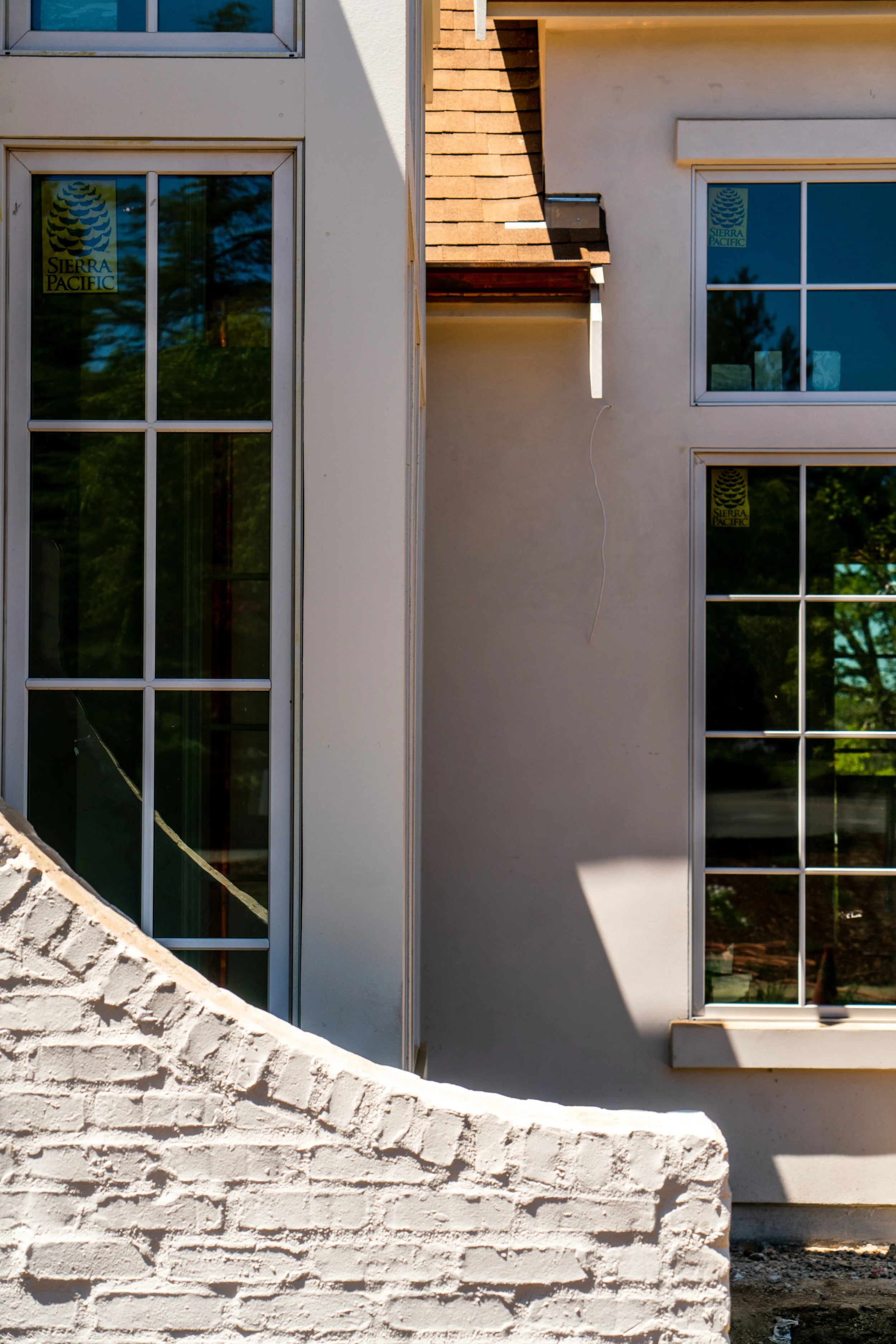 Beautiful stucco exterior with luxurious new windows