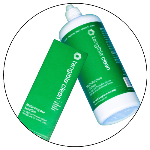 A bottle of Tangible Clean multi-purpose solution next to its green packaging box.