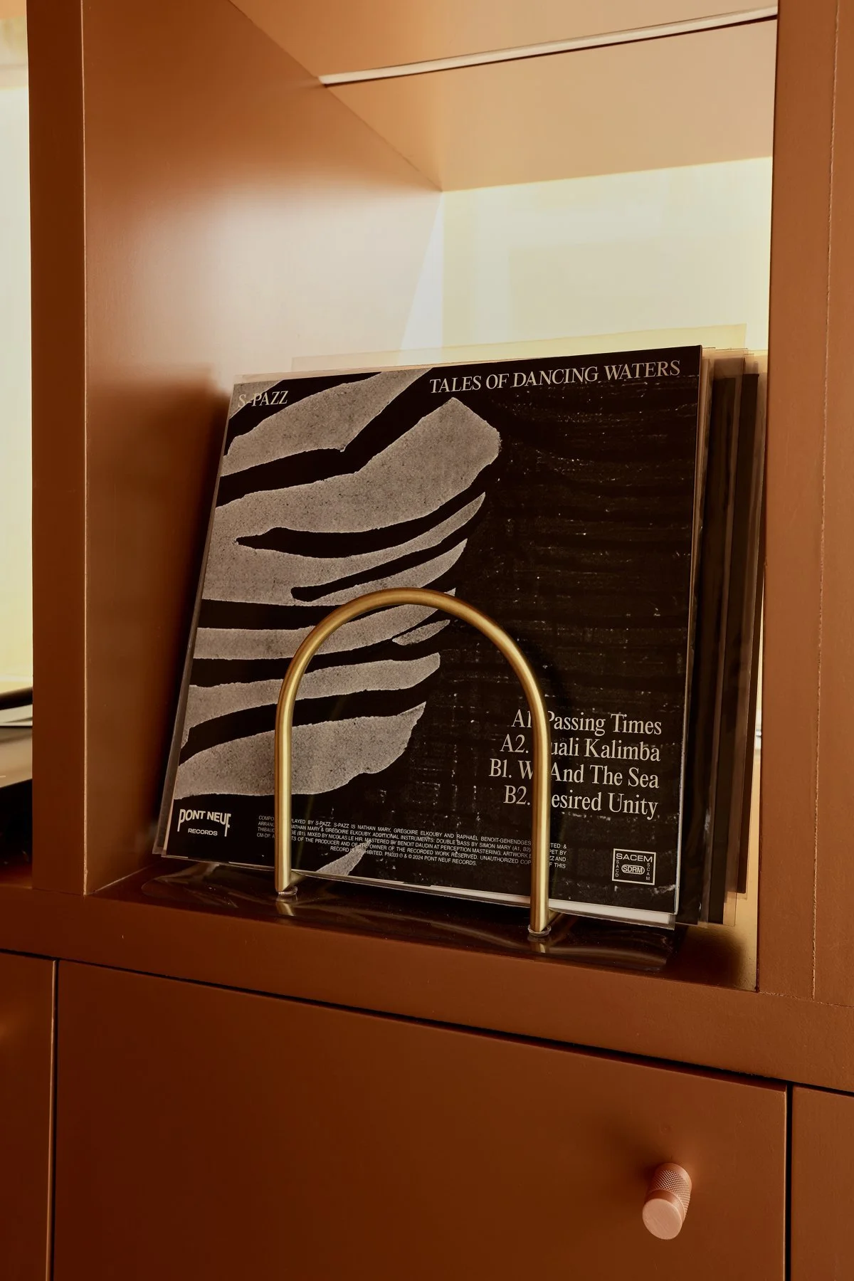 A vinyl record on display in the studio lounge