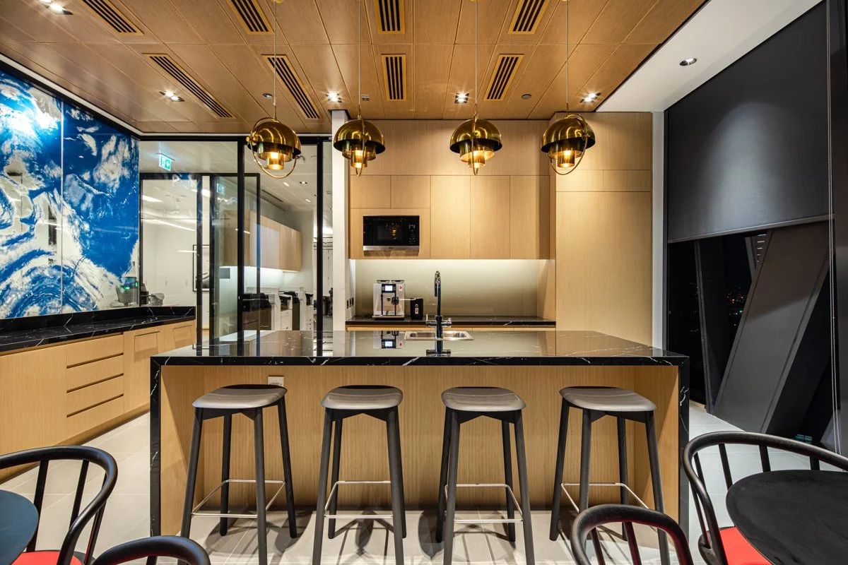 Modern kitchen with a black marble island