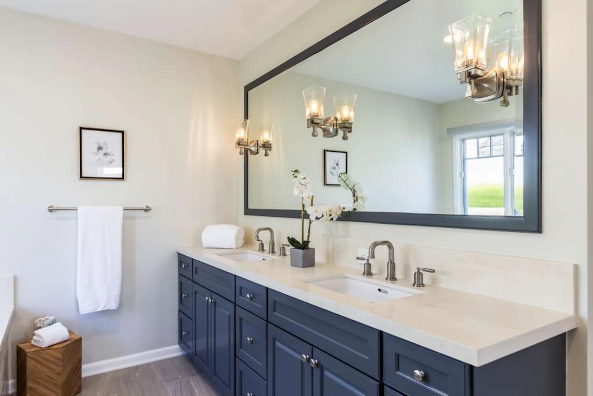 Bathroom repair and renovation with double sink vanity and modern fixtures