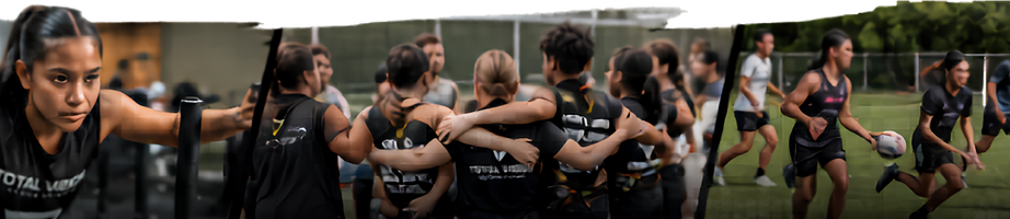 Group of female athletes in black uniforms huddling on a field during a practice or game.