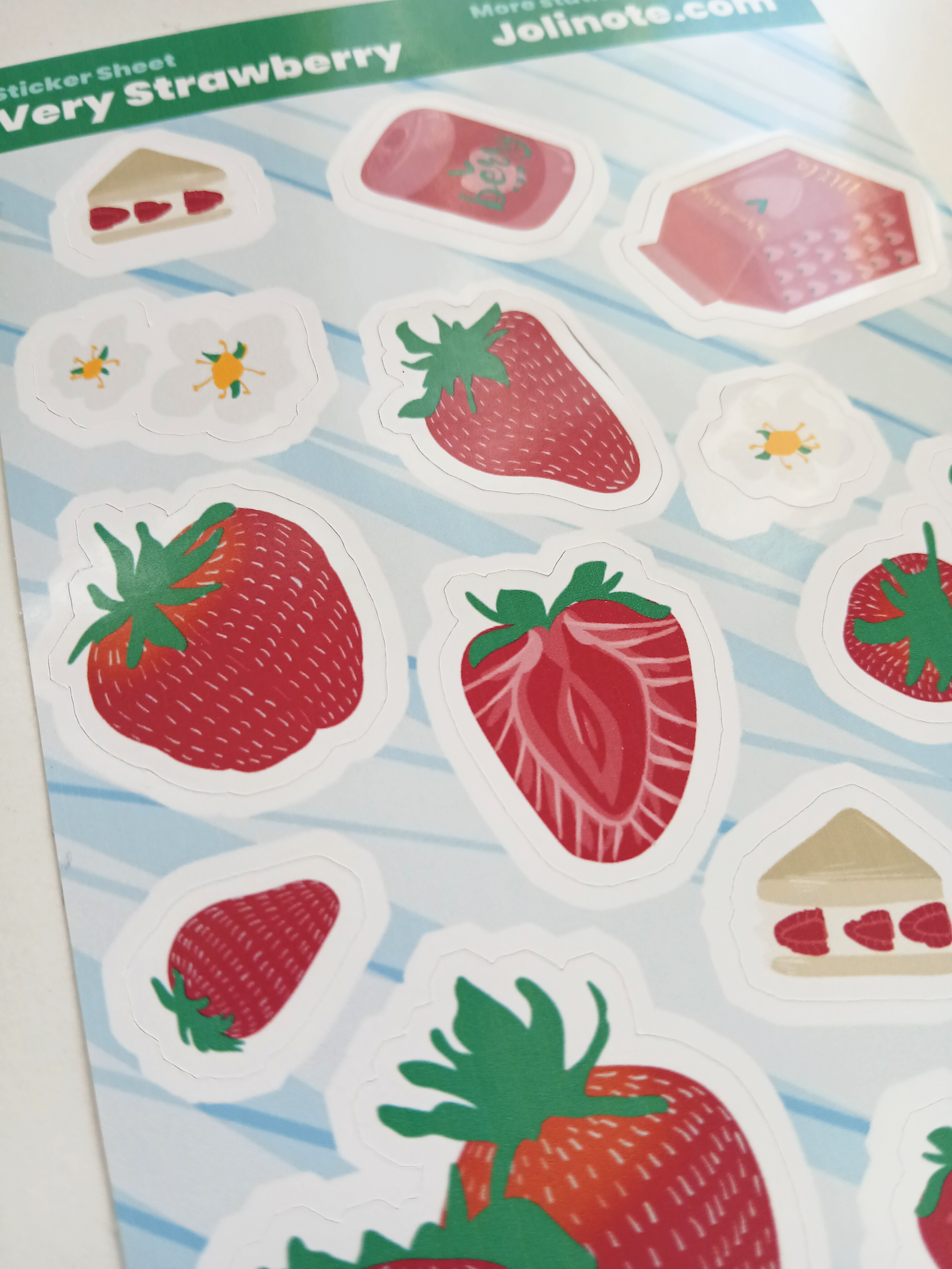 strawberry sticker sheet close up.png