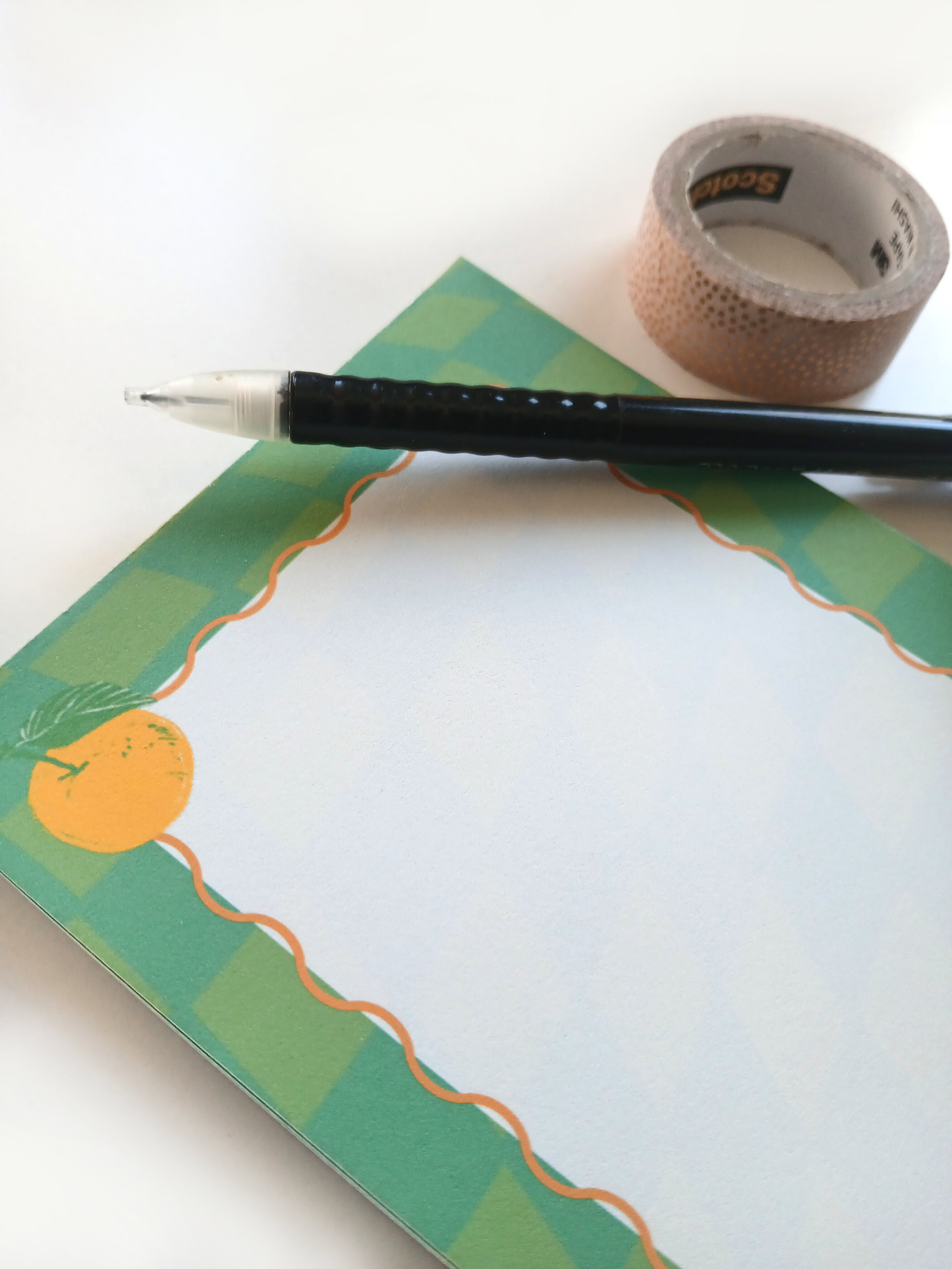 orange_notepad closeup.png