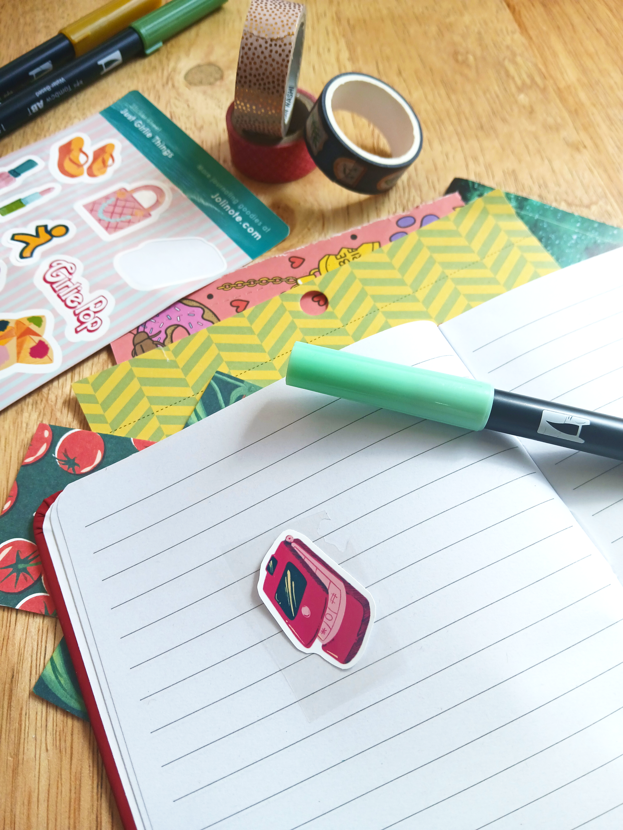 JGT sticker sheet lifestyle in action.png
