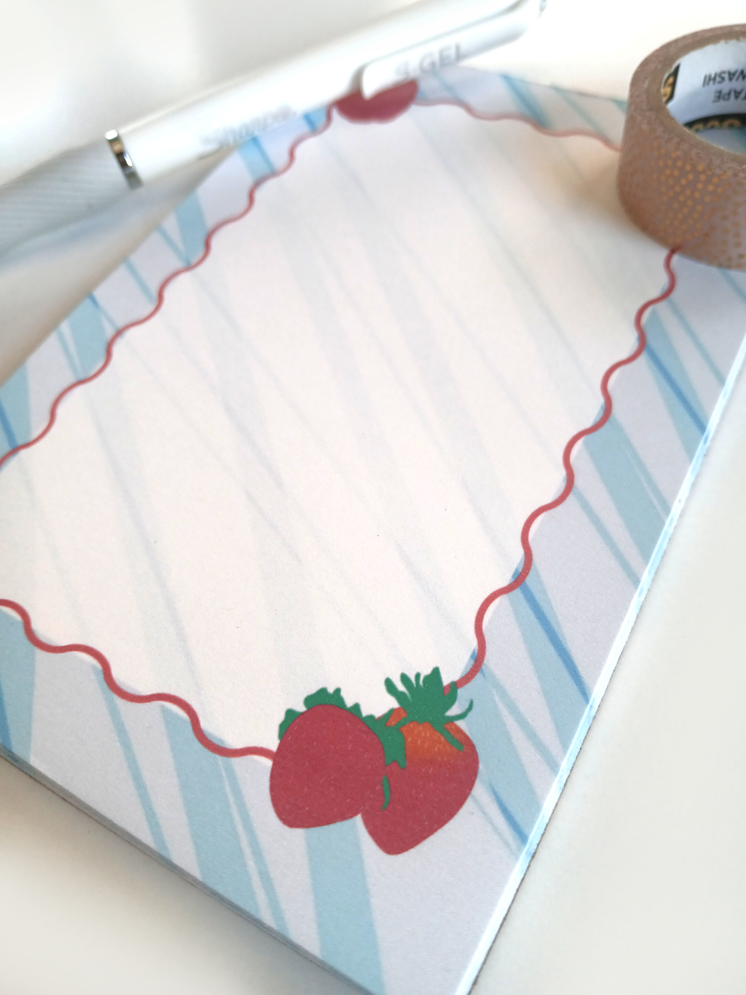 strawberry_notepad closeup.png