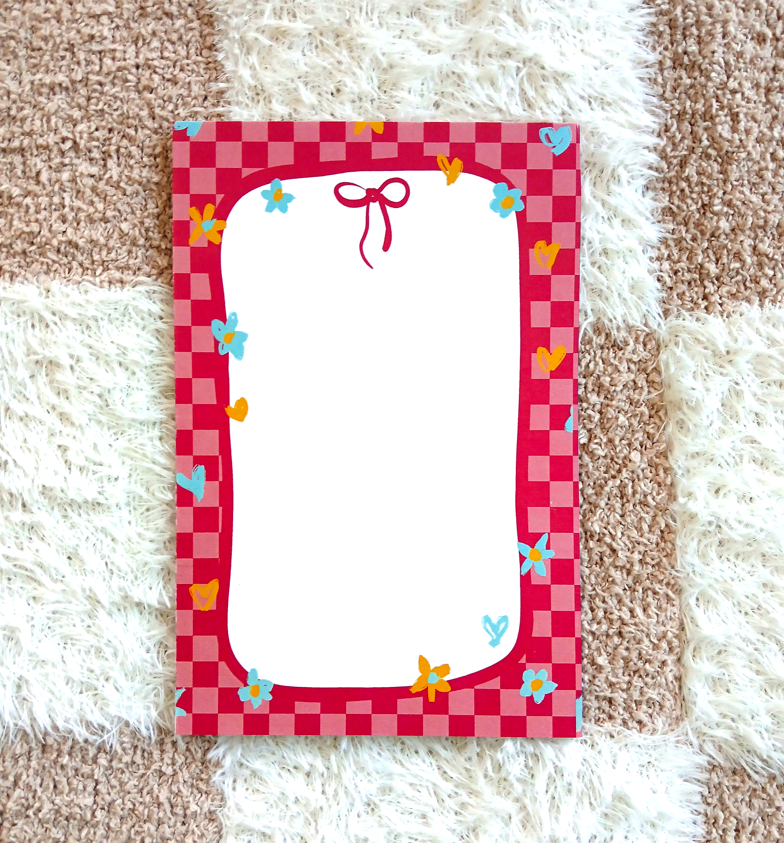 JGT Notepad front.png