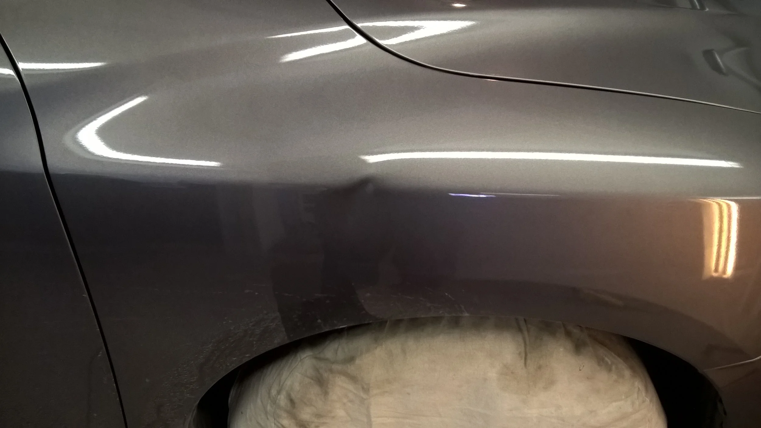 example of a Bodyline Chop or Break in a strong SUV fender; Starting $120 Paintless Dent Removal at Tigerroad Auto Protection LLC Haines City