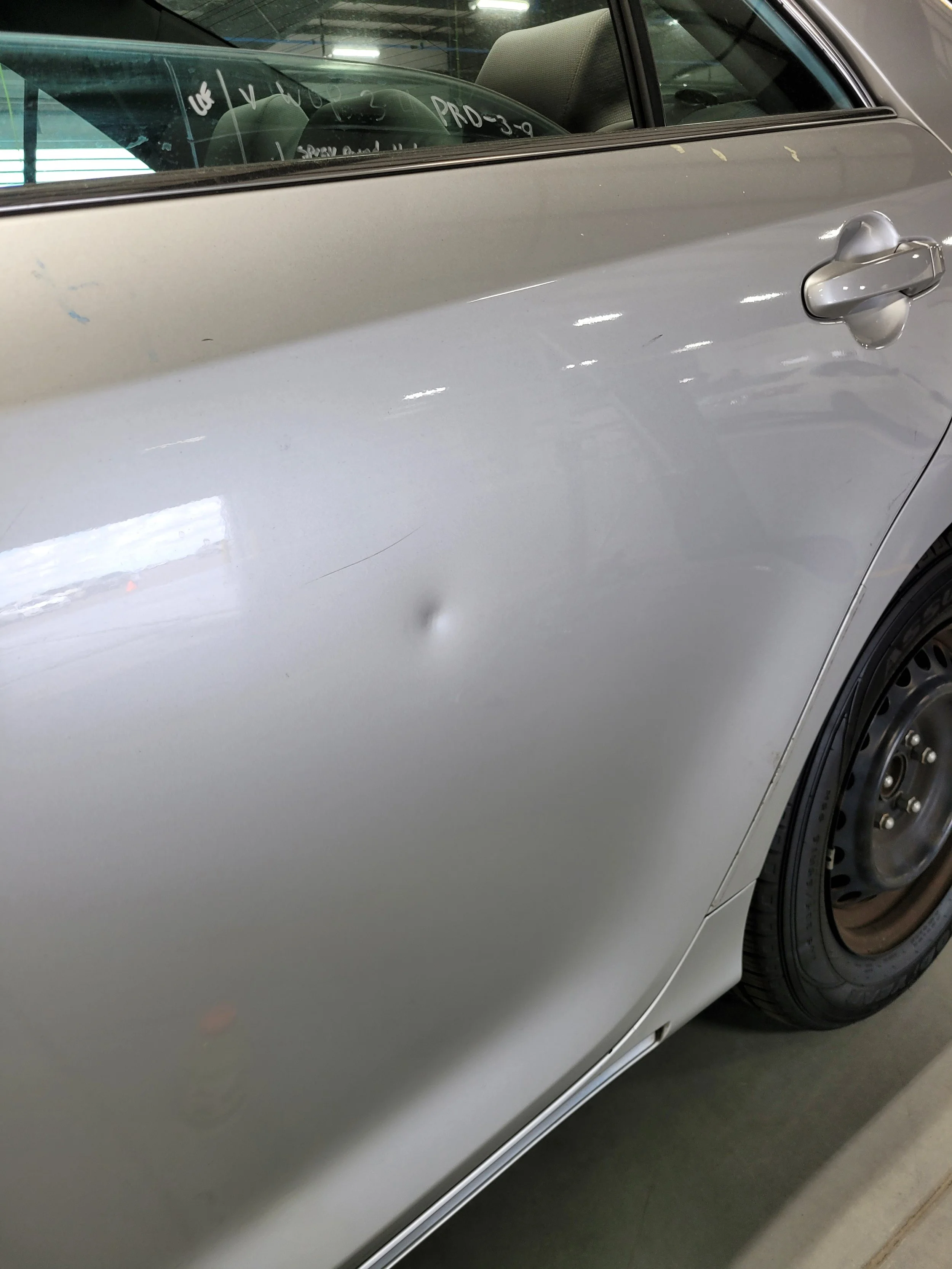 Deep Golf Ball hit Semi Stretched with Imprint, Before PDR Work