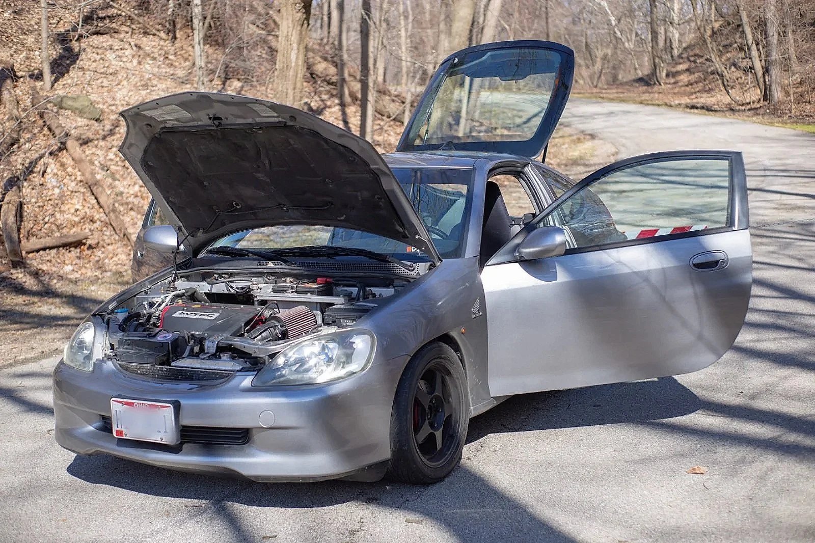 2000 K20A3 Swapped Honda Insight with TSX Cams and Vtec Killer valve train setup. Tuned by Innovative Motorworks, with Short ram intake and 2.5in exhaust. Tigerraod Performance V2 LED headlights with DRLs and Morimoto Switchbacks and Reverse camera