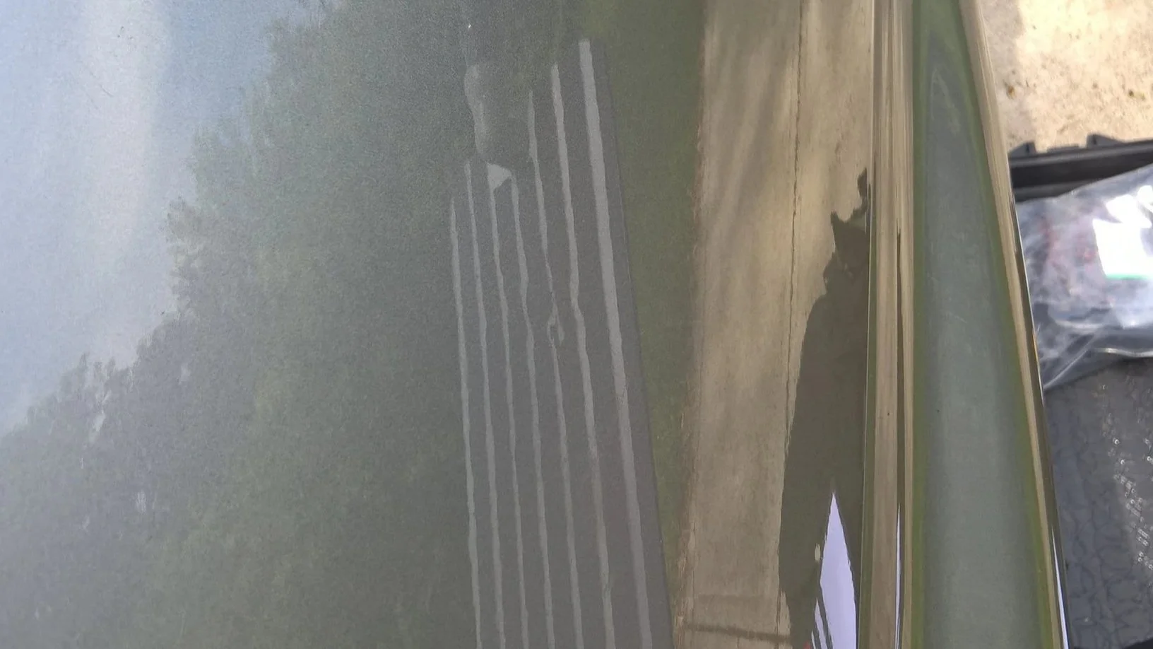 Ding in 2000 Honda ZE1 insight, Aluminum Paintless Dent Removal starting $40 at Tigerroad Auto Protection LLC