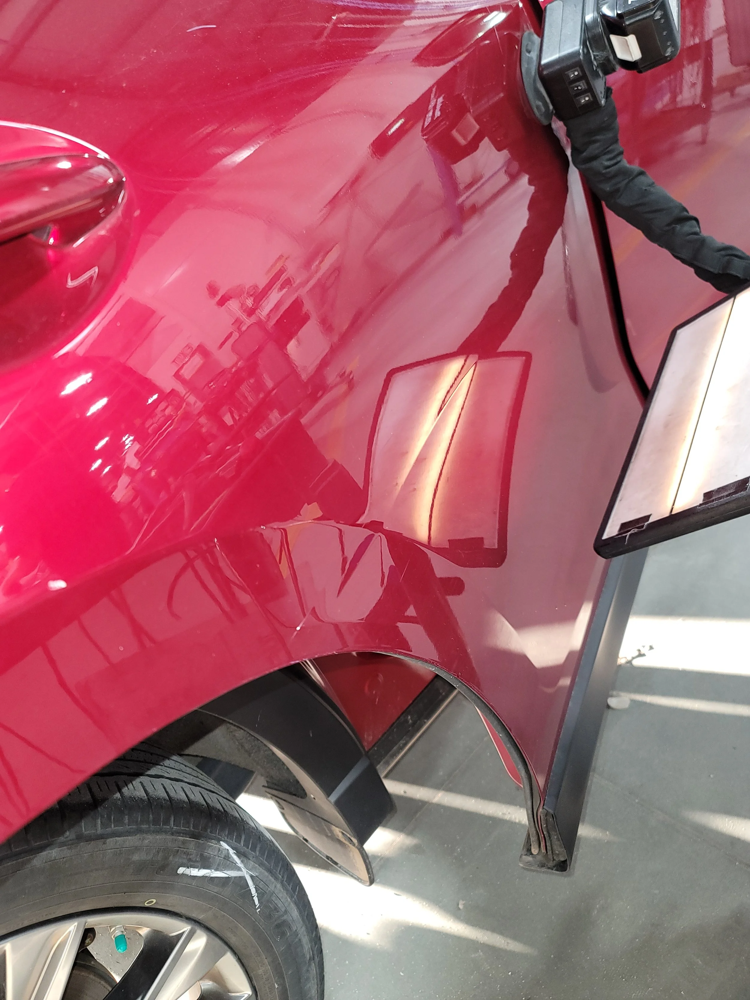 Long Advanced Crease Straight Through Bodyline in SUV Passenger rear Door; Paintless Dent Removal starting $400 at Tigerroad Auto Protection LLC