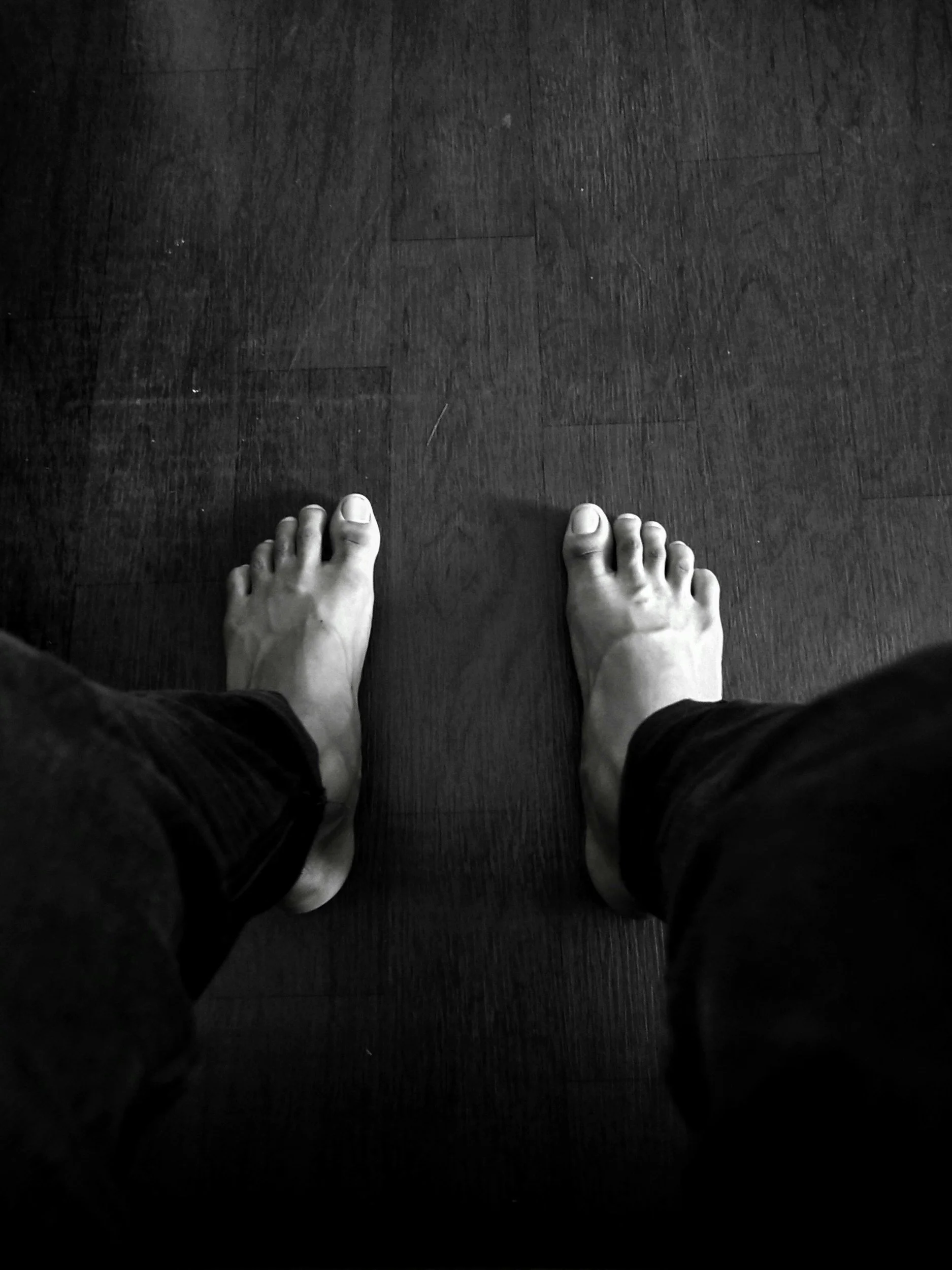 Person grounding through body awareness during a somatic therapy exercise to support nervous system regulation