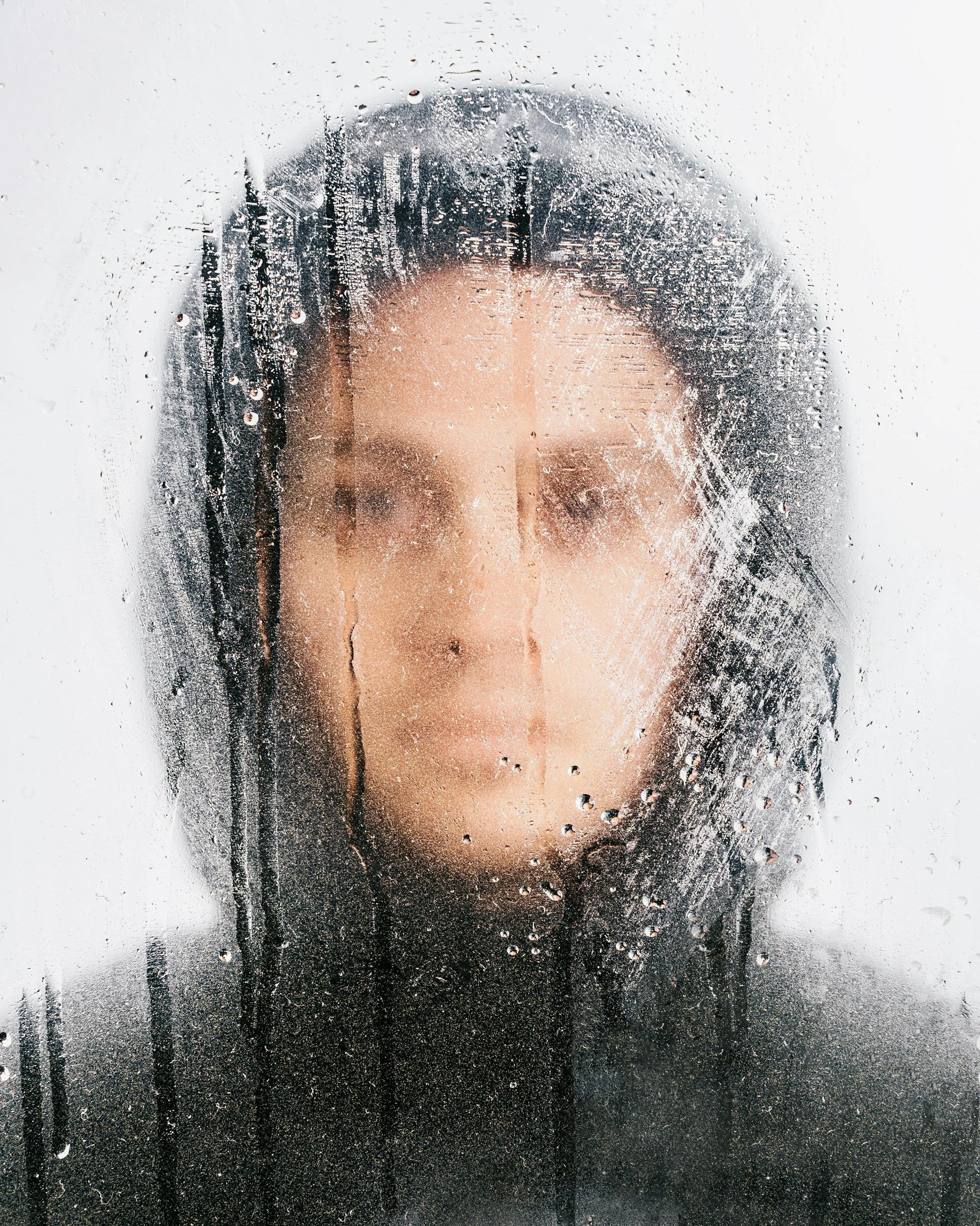 Person experiencing the overwhelming uncertainty and narrowed focus often associated with obsessive-compulsive disorder