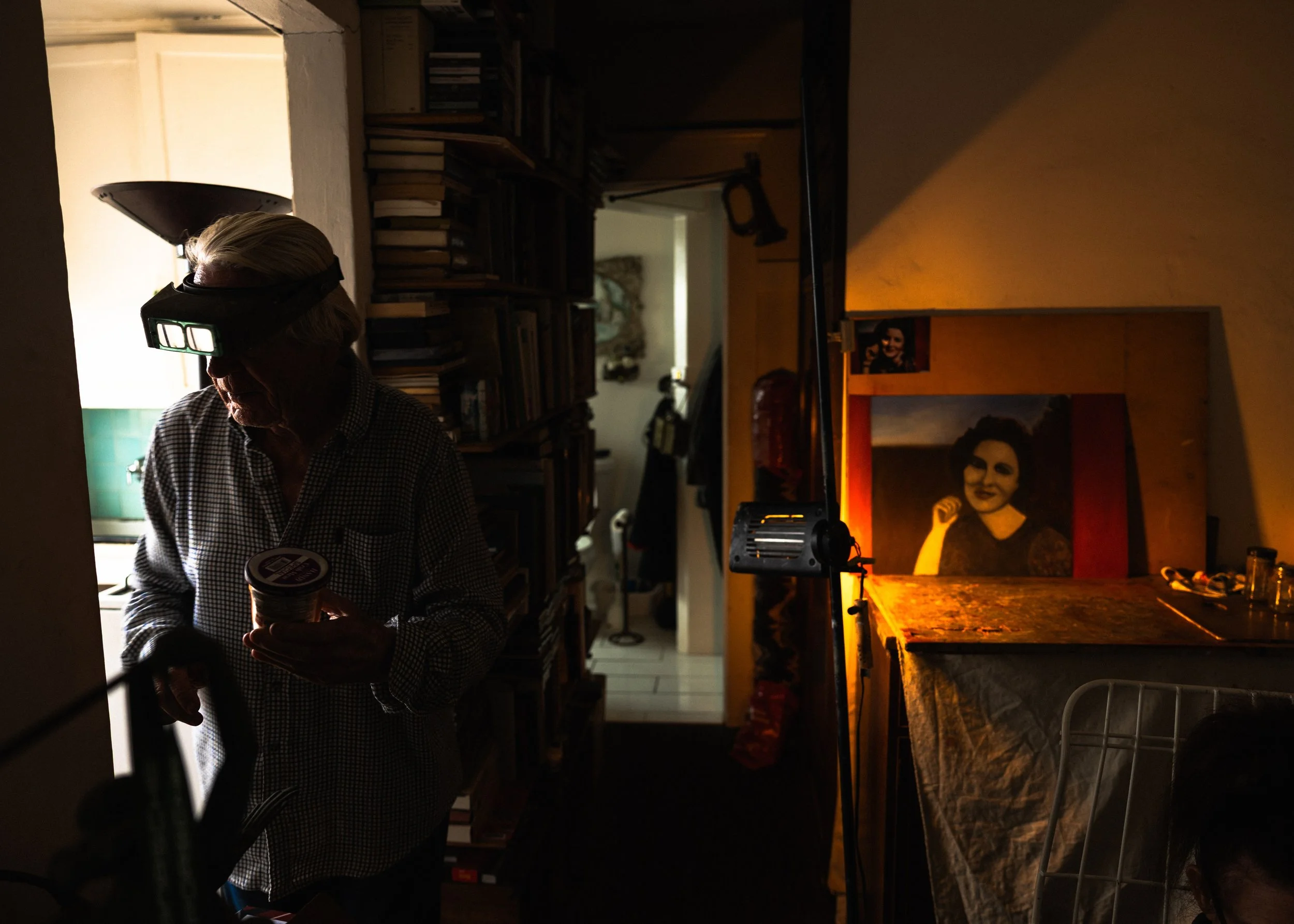 When looking around his home, my eyes are met with a portrait of Eva Braun, Hitler's wife and companion in death. 