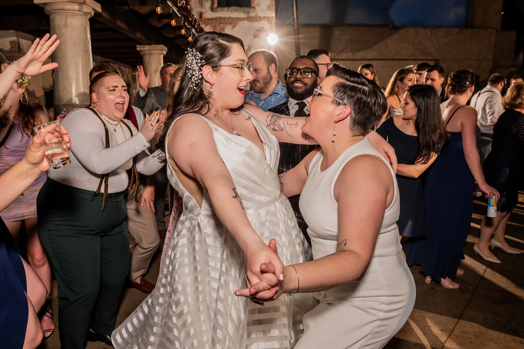 Two brides dancing, gay weddings nyc entertainment.
