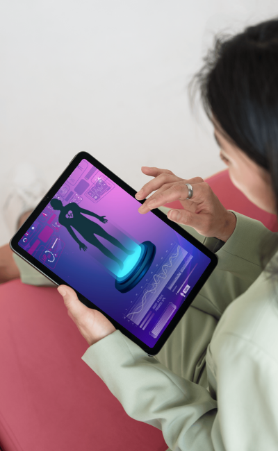 A woman holding a tablet with a sci-fi style interface displaying a human figure and scientific data.