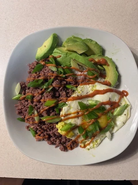 Korean Rice Bowl topped with The Sizzle Sauce