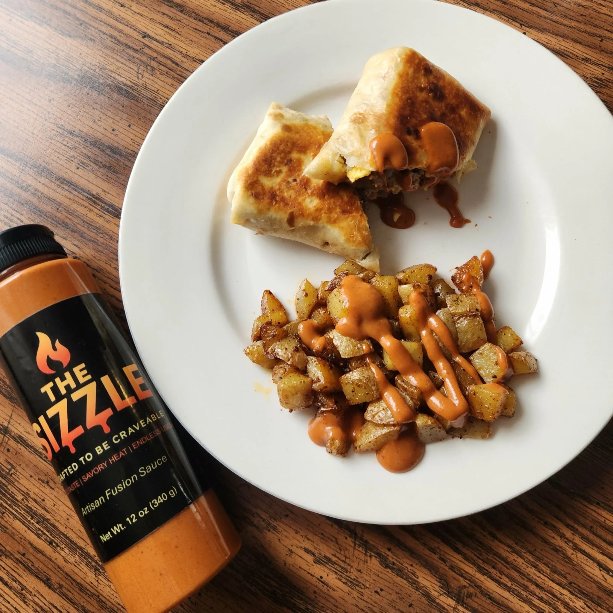 breakfast burrito and home fries with the sizzle