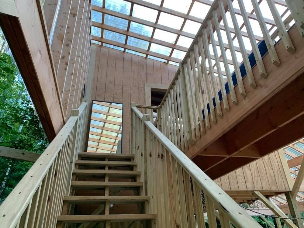 Stairs up to the bunk rooms.