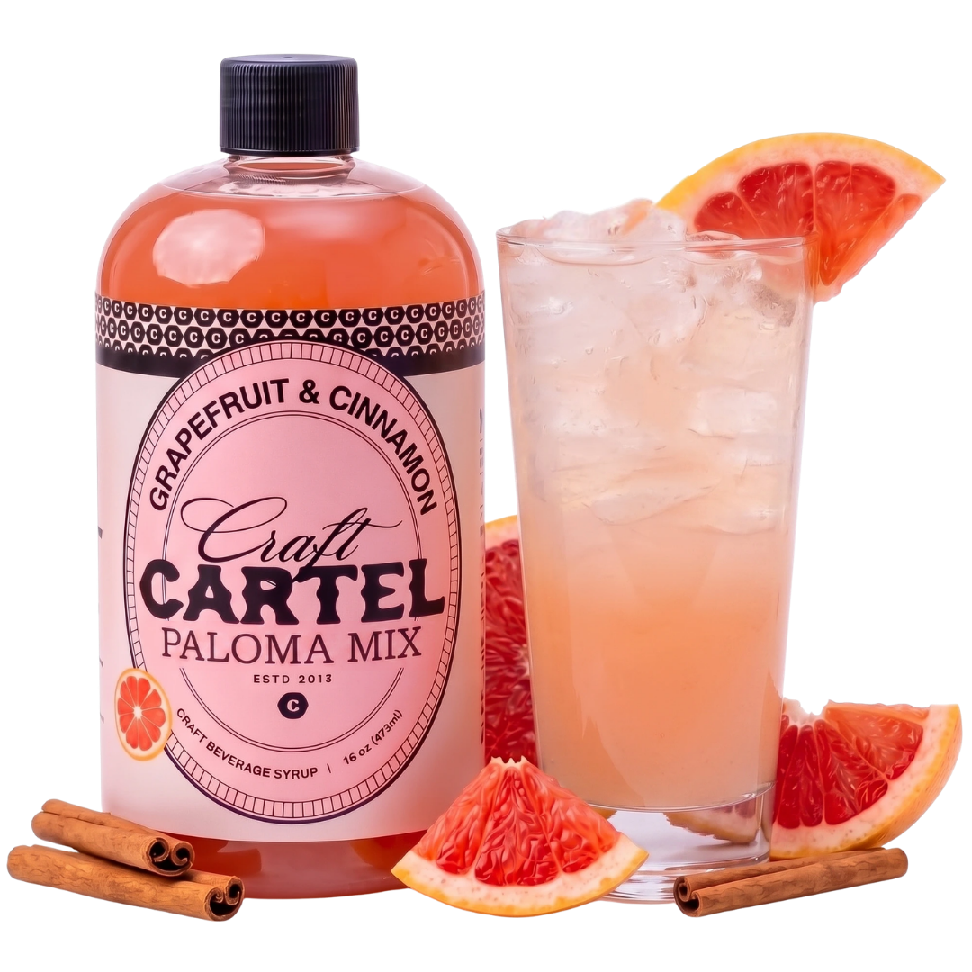 A bottle of Grapefruit & Cinnamon Paloma Mix with a glass of ready Paloma garnished with grapefruit slices and cinnamon sticks.