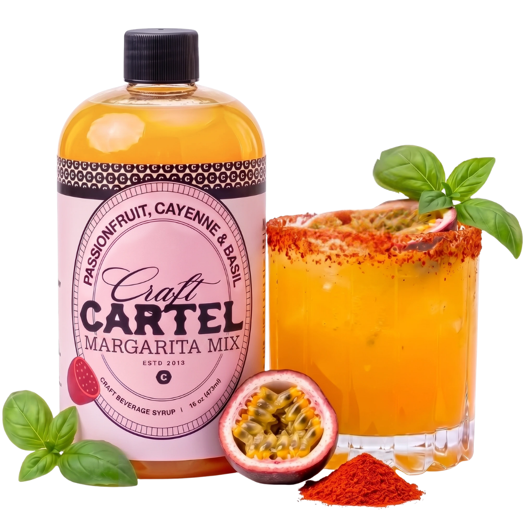 A bottle of craft margarita mix with passionfruit, cayenne, and basil flavors, a glass of margarita with basil garnish, passionfruit half, red chili powder, and a basil leaf.