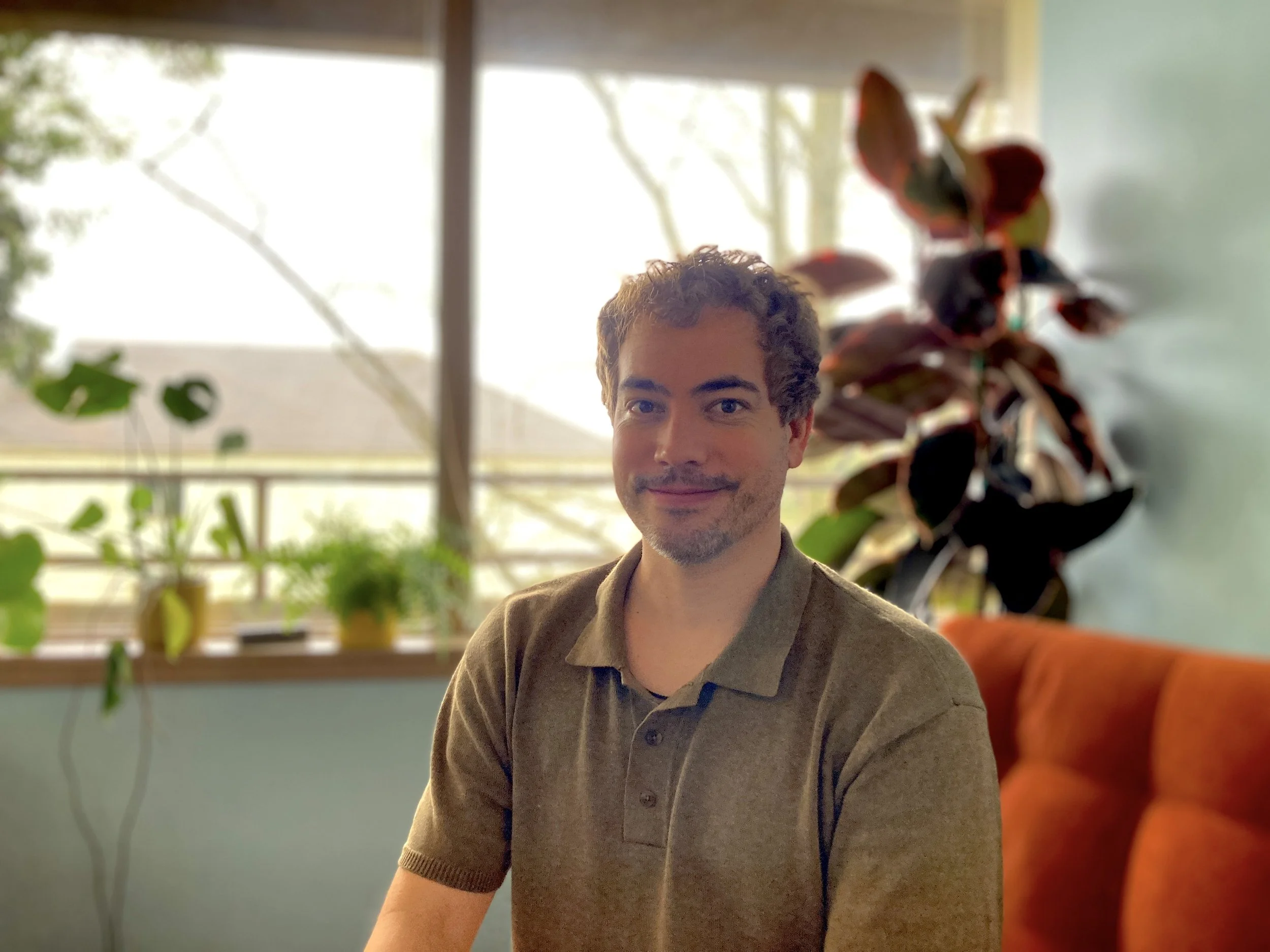 Portrait of mental health therapist, James Oxford, LMHC.