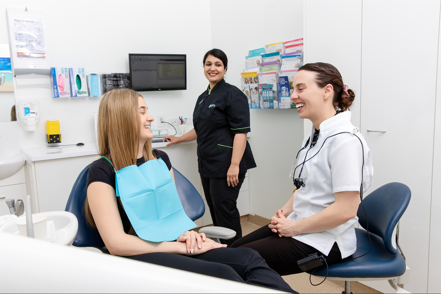 Dentist talking with a patient at SV Dental Sun Valley