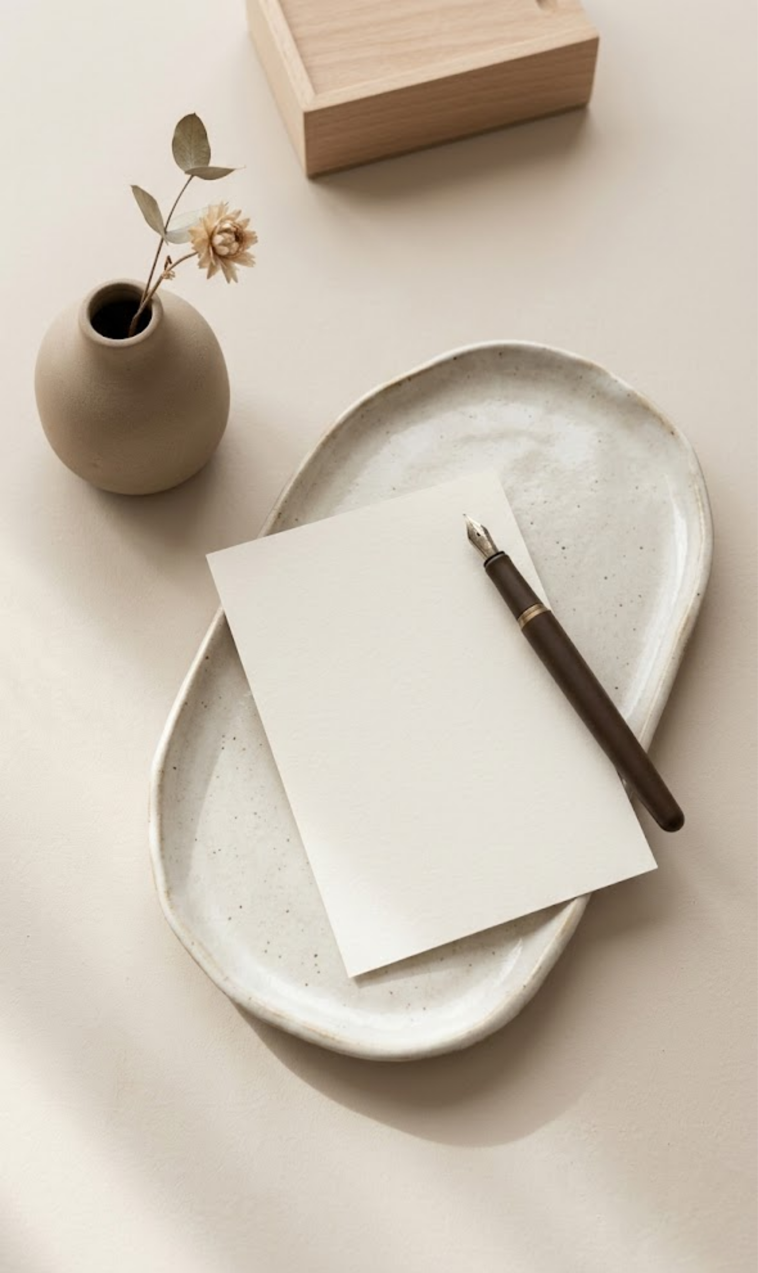 Contact Speaking Semantics in White Plains, NY for pediatric speech therapy. Minimalist workspace aesthetic featuring a handwritten note and fountain pen.