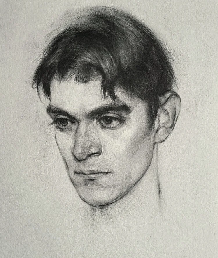 Pencil sketch of a man's head with dark hair, large eyes, and a serious expression.