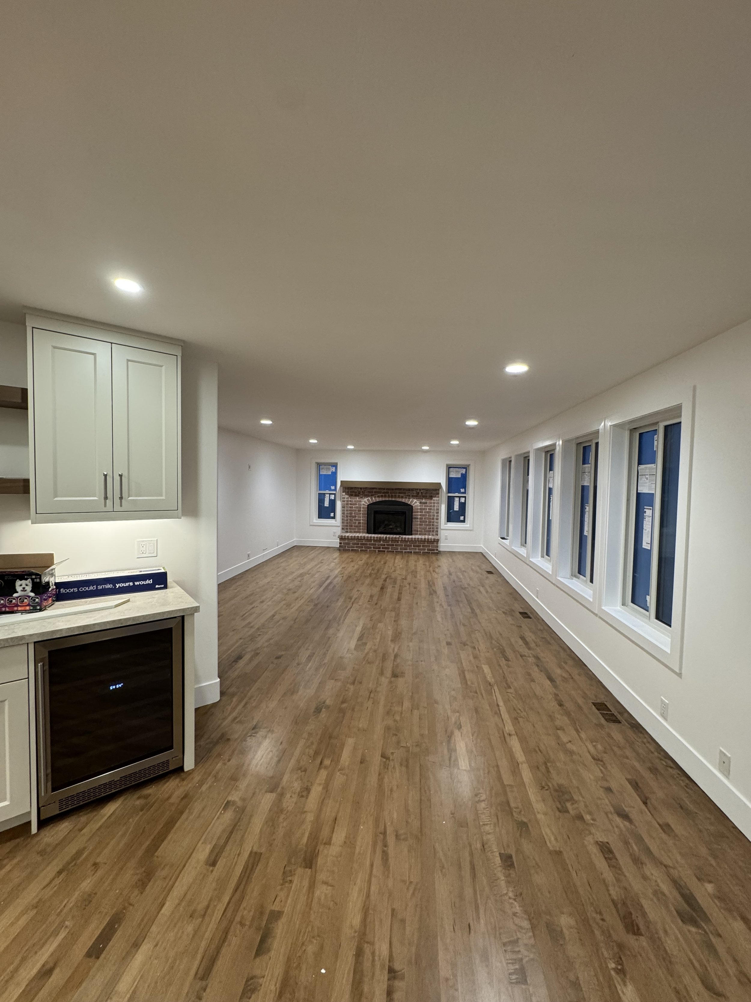 A new look to a beautiful living room with new cans